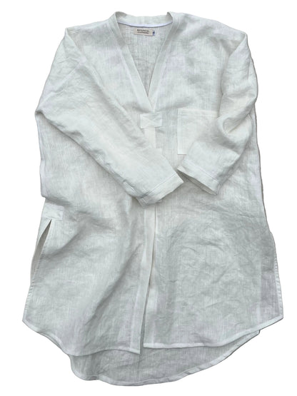 White hemp tunic on a gray background